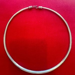 Sterling silver torque necklace.  Museum of Art NYC design.